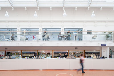 Brighton Dome Foyer bar on lower level & Mezzanine on upper level, with the walls and bar all white