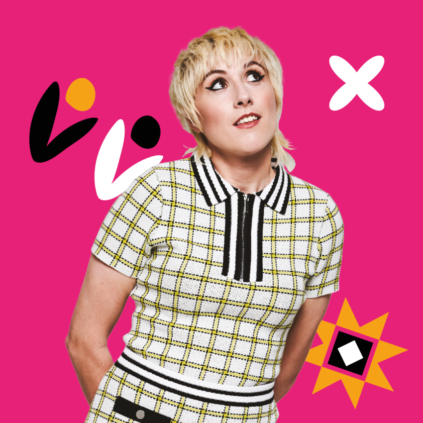 Maise Adam wearing a smart, colourful suit dress against a bold pink background