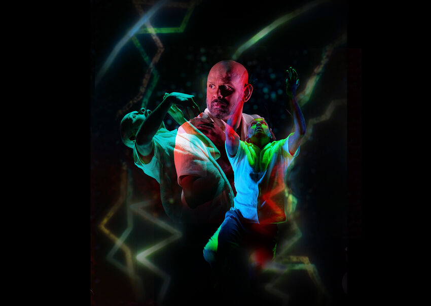 An overlay of multiple images of the performer are highly coloured. It communicates a sense of movement and high energy