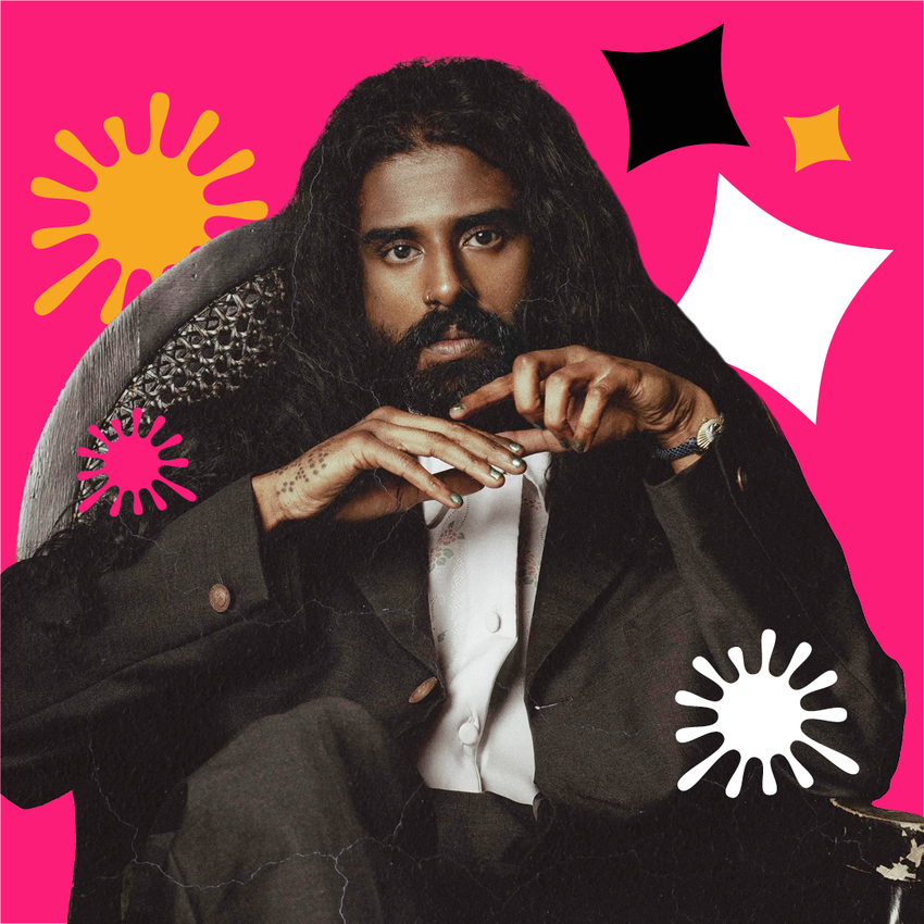 Vidura Bandara Rajapaksa sitting down holding his hands together, over a pink background