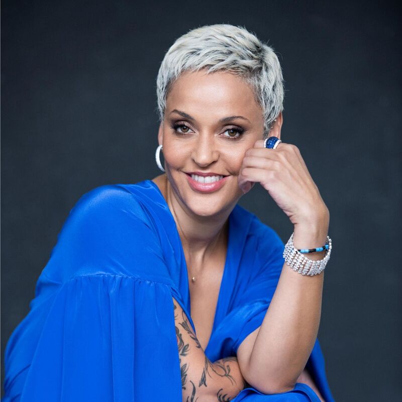 Mariza wearing a floaty royal blue dress