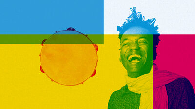 Man smiling with a tamborine over a blue, white, yellow and pink square background