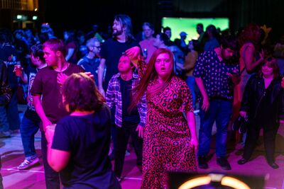 Log in Sign up for free You said: Blue Camel Club_Corn Exchange_Dancer 1_10.12.25 - Photo by Ollie Denton .jpg write alt text for this  ChatGPT said: A crowd dances at a nightclub under vibrant pink, purple and blue lighting, with a woman in a pink leopard-print dress standing in the foreground.