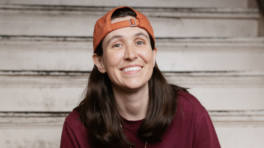 Ashley Gavin sat on stone steps