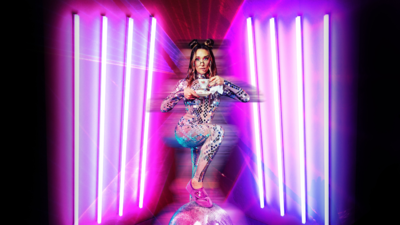 A photo of sophie mccartney with purple neon lights
