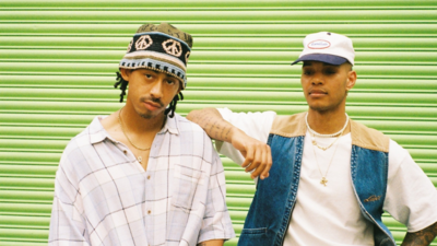 photo of rizzle kicks against green backdrop 
