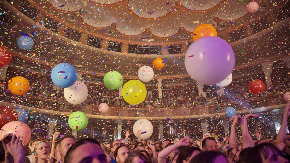 Colourful ballons and confetti over an audience at a Flaming Lips gig