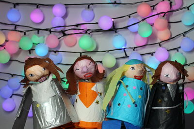 Small table-top puppets resembling ABBA