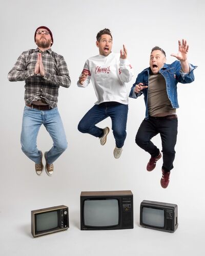 Scouting for Girls, three men jump each above an old TV