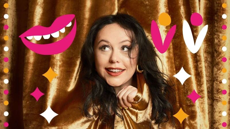 Amy Annette peaking out of a gold curtain with pink, white and yellow lips, flowers and stars surrounding her