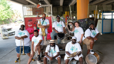 Hot 8 Brass Band with their instruments