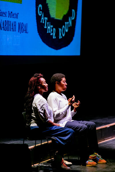 Two BSLIs sat on chairs