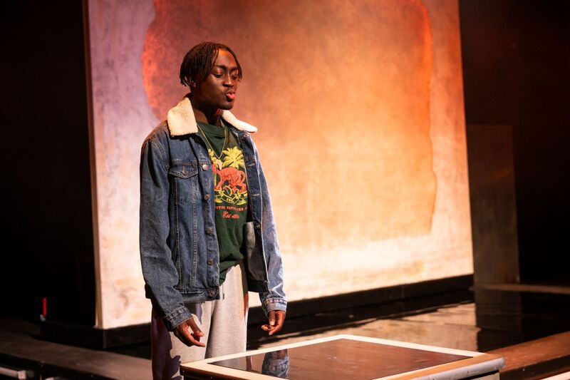 Selorm Adonu stands on stage 