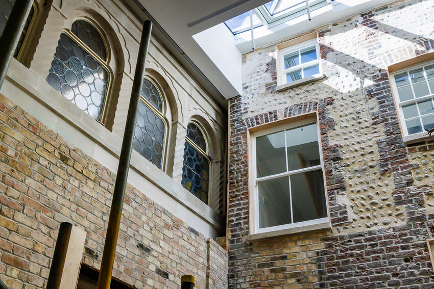 Interior walls made of brick and stone with windows