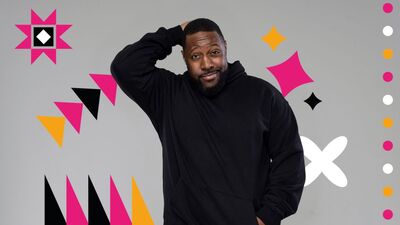 Aurie Styla wearing an all black tracksuit