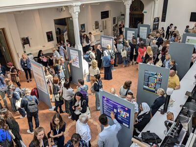 A busy foyer bar with booths set up
