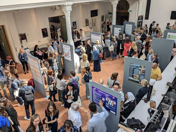 A busy foyer bar with booths set up