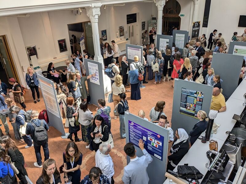 A busy foyer bar with booths set up