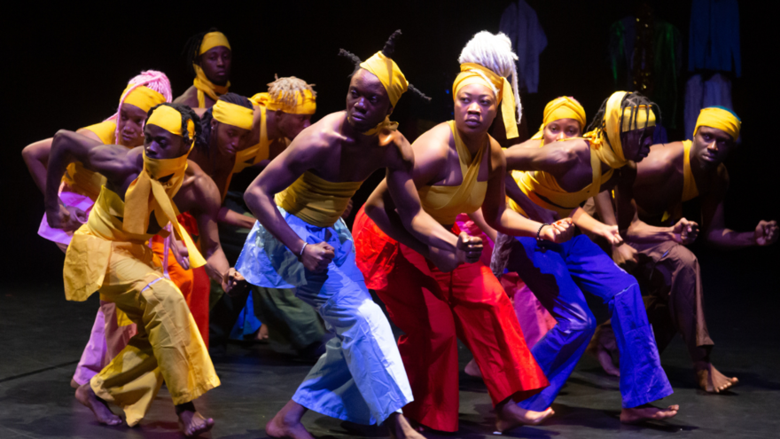 A group of Nigerian dancers in colourful trousers