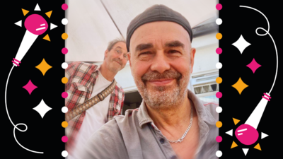 Boothby Graffoe & Antonio Forcione smiling at the camera