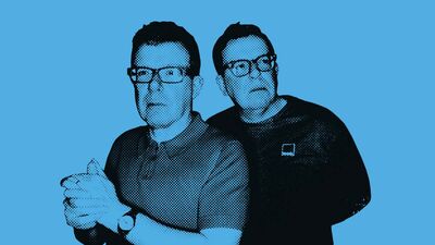 Two men with glasses staring away from each other. The photo is black and blue with a grainy effect