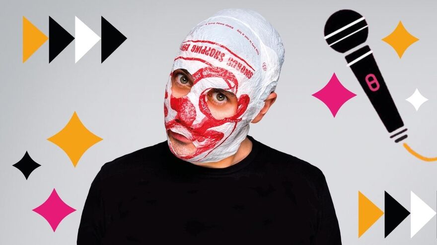 A man wearing a black t-shirt and a mask made from a white plastic shopping bag