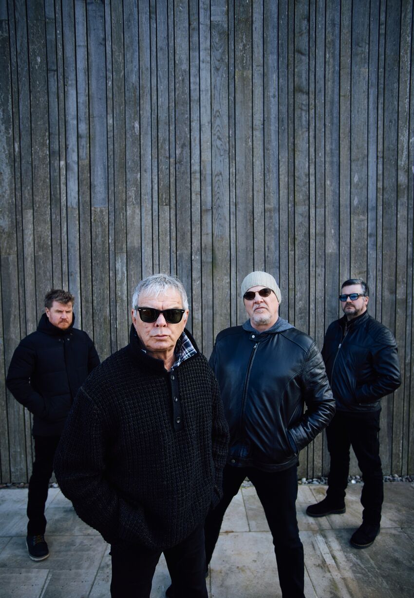 The Stranglers posing in formation