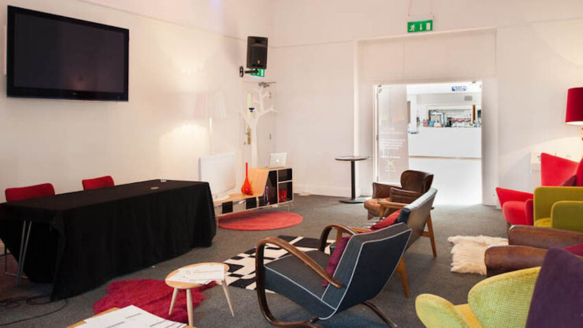Colourful chairs are set up in Brighton Dome's Founders Room