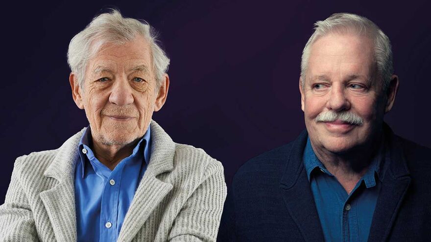 A deep purple backdrop with an image of Ian McKellan wearing a blue shirt and cream corduroy blazer on the left, and Armistead Maupin wearing a blue shirt and navy coloured blazer on the right