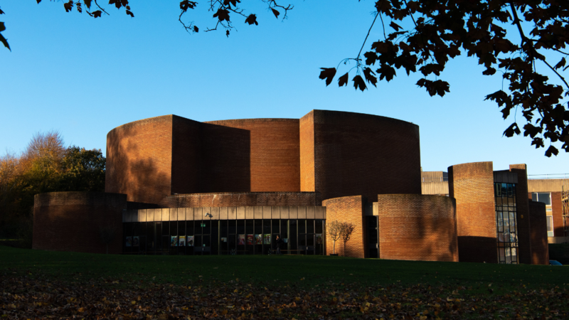 Exterior of University of Sussex brick buildings with circcular design