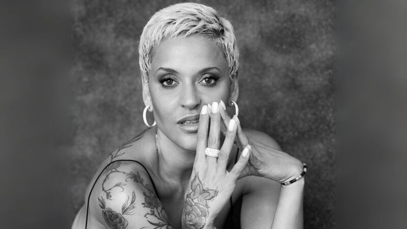 Mariza with a short blonde pixie cut and sparkling jewellery 