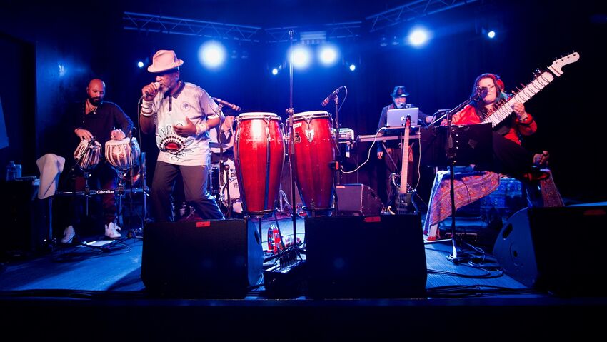 Transglobal Underground performing on stage